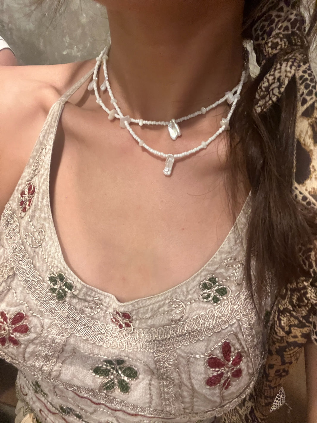 Convertible double layer white seed bead shell choker necklace on collarbone